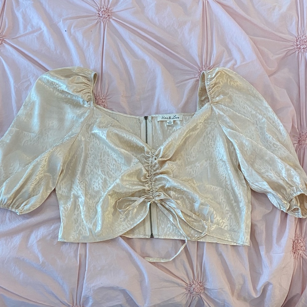 Cream colored cheetah print crop top